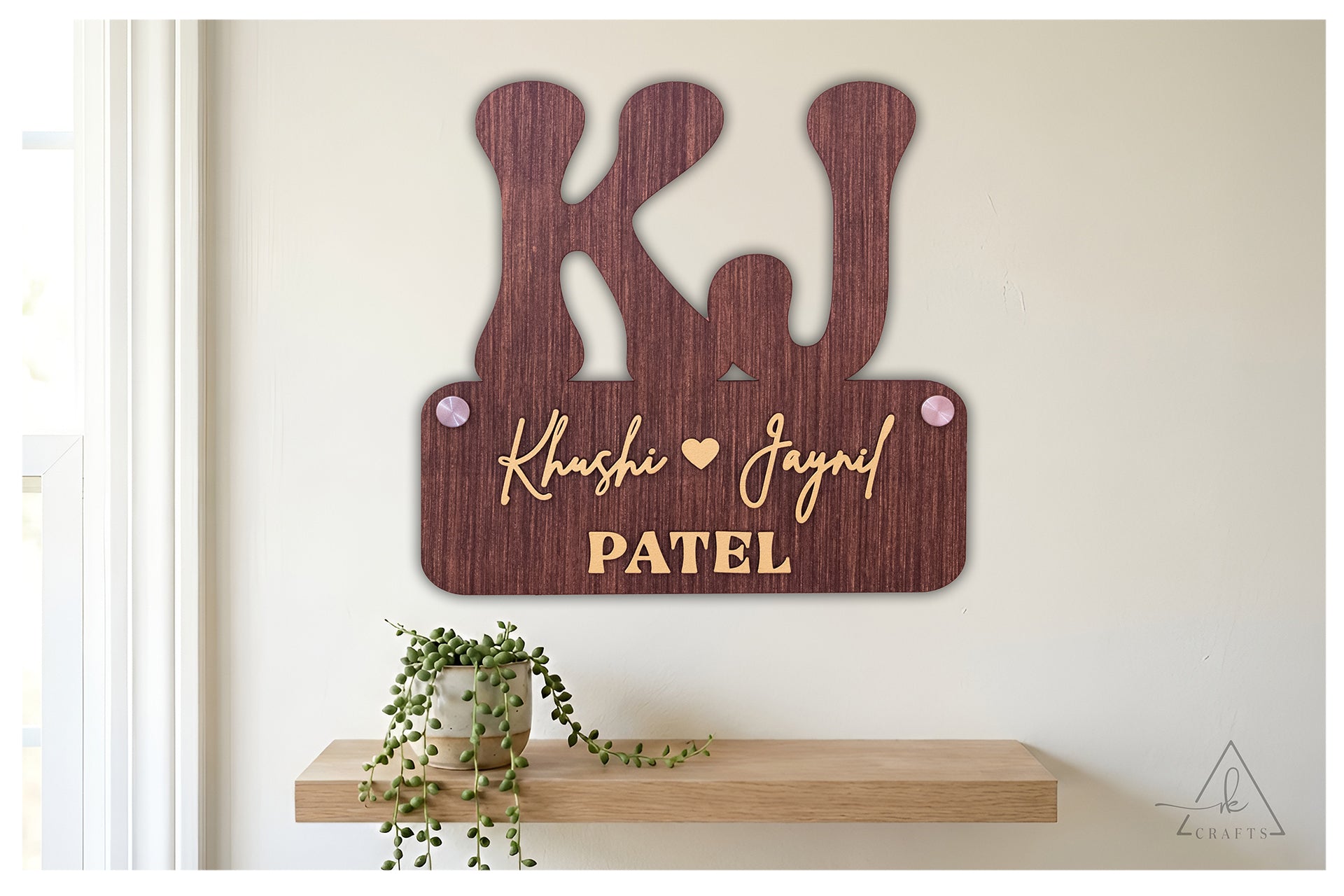 Personalized 3D wood monogram sign beautifully displayed as an elegant anniversary or housewarming gift.