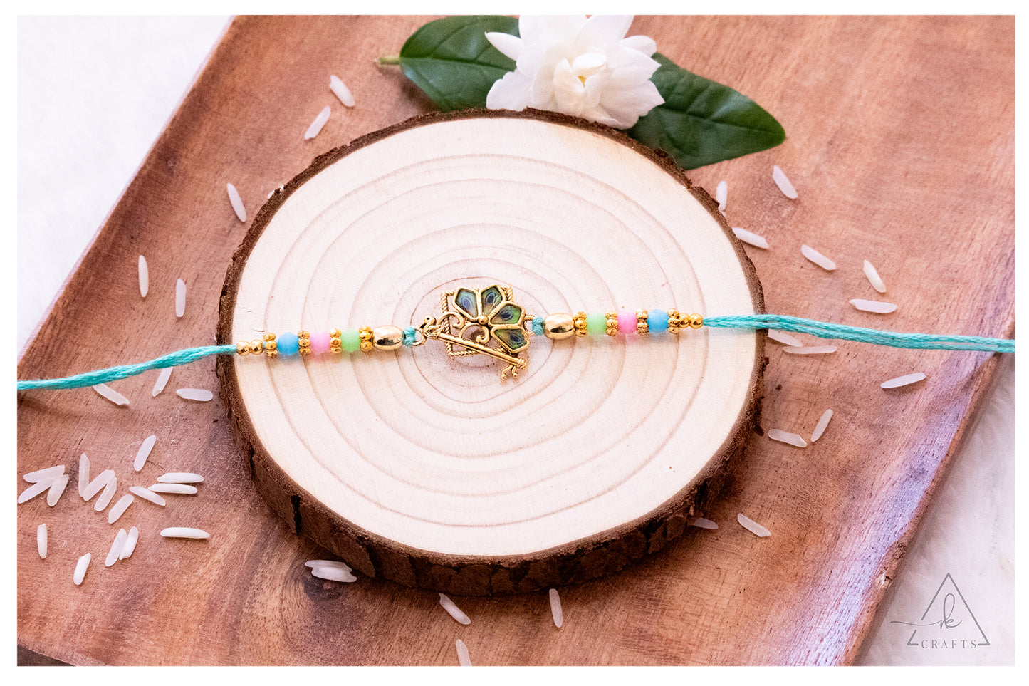 Peacock Feather Flute Rakhi